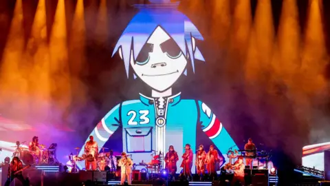 Gorillaz perform on stage