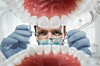 A dentist examining teeth