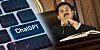 Composite image of a judge and a keyboard with ChatGPT on a key