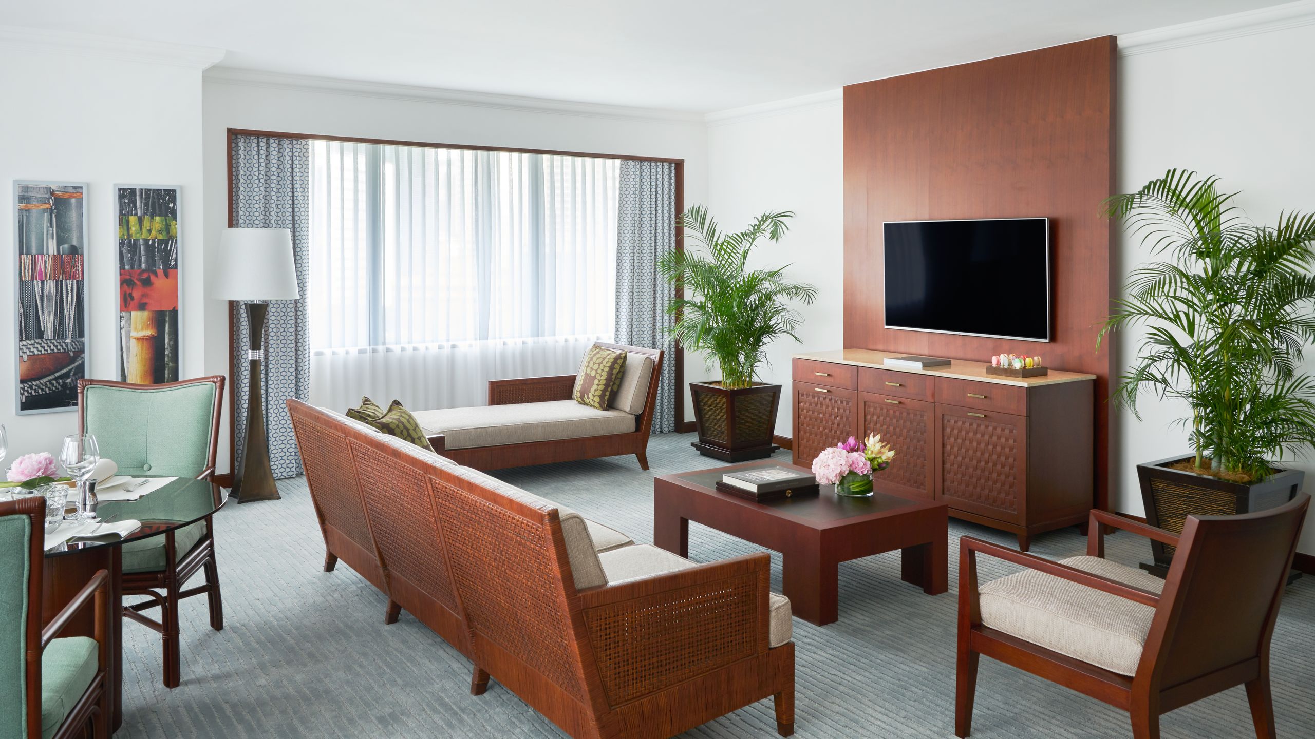 Image may contain: Architecture, Building, Furniture, Indoors, Living Room, Room, Interior Design, Plant, Table, and Couch