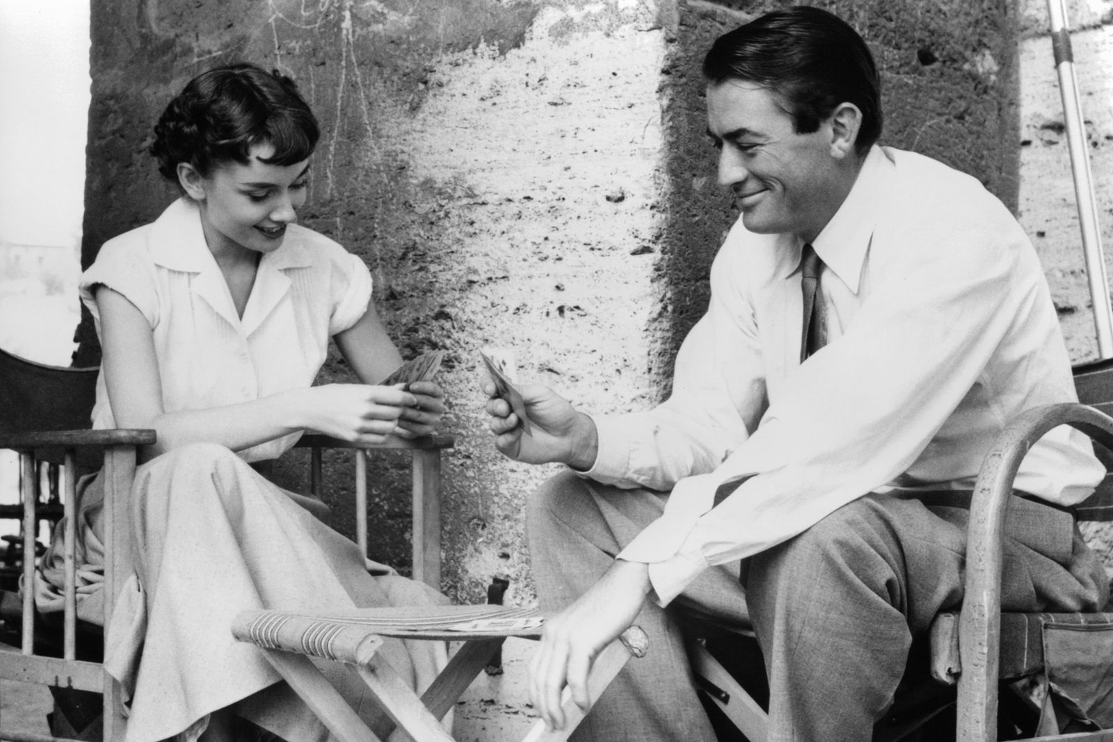 Image may contain Gregory Peck Body Part Finger Hand Person Face Head Photography Portrait Adult and Sitting