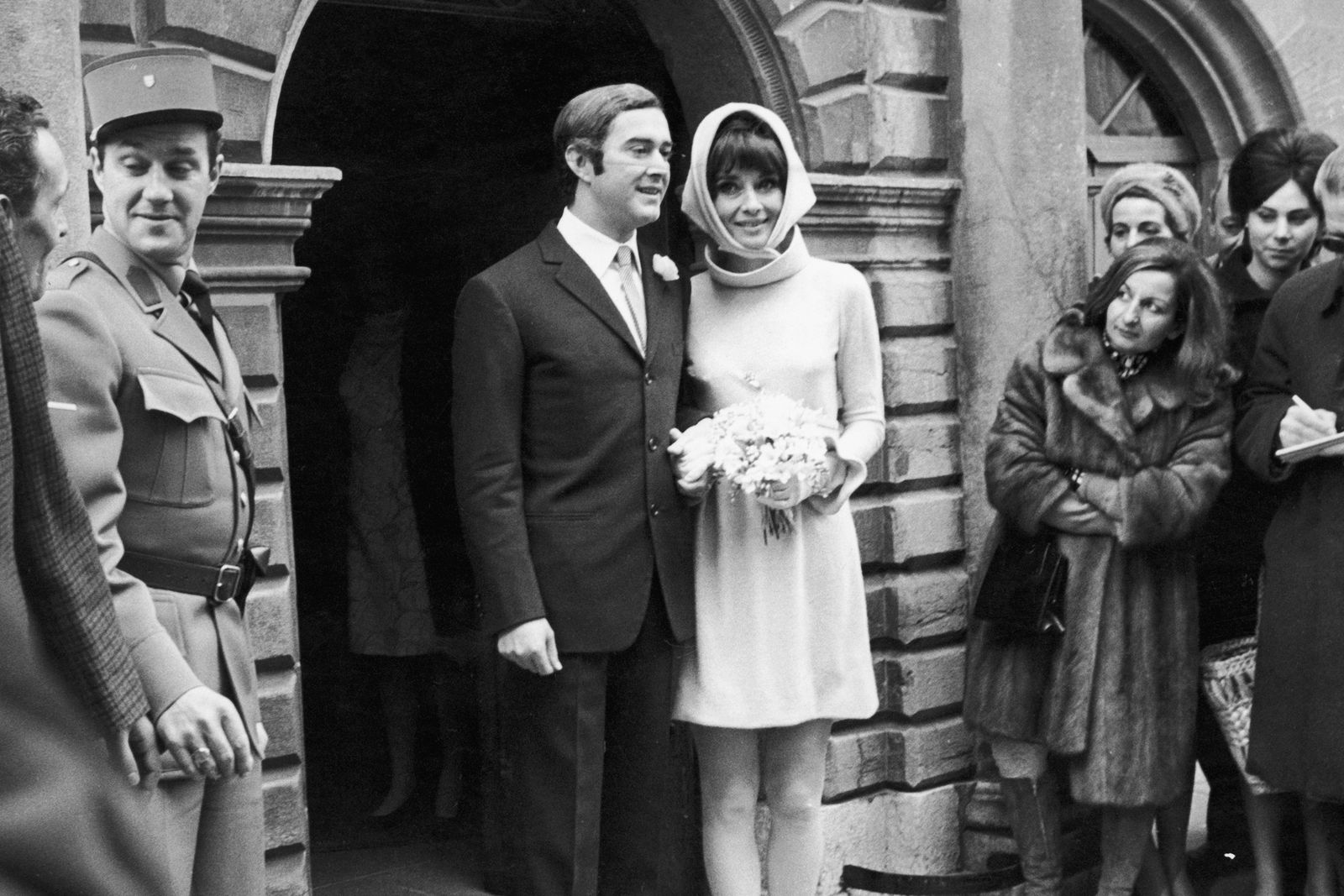 Image may contain Audrey Hepburn Clothing Formal Wear Suit Flower Flower Arrangement Flower Bouquet Plant and Face