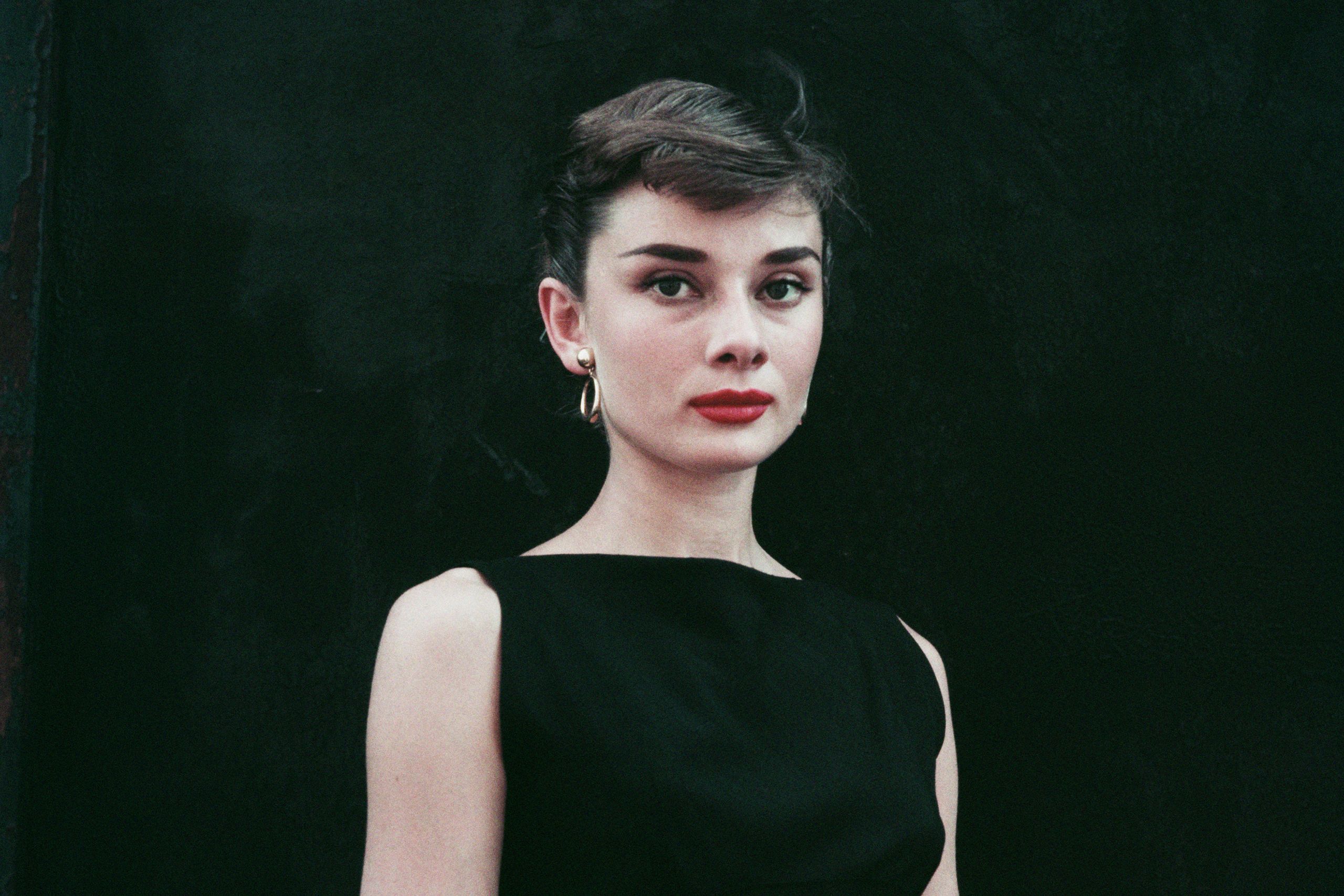 Image may contain Audrey Hepburn Face Head Person Photography Portrait Body Part Neck Adult Black Hair and Hair