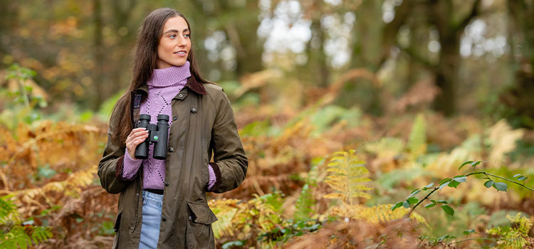 Brunette young woman with RSPB binoculars