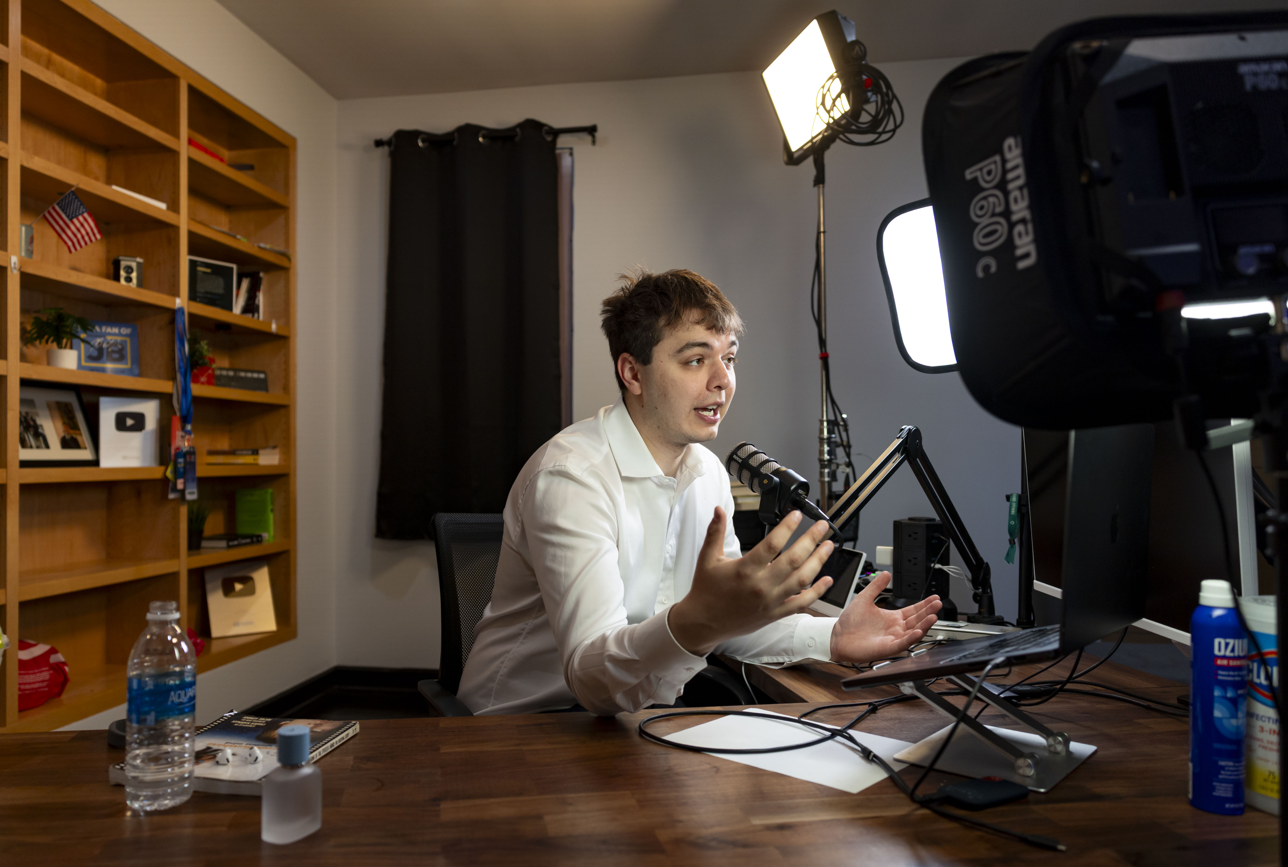 Political commentator Adam Mockler, 23, records a video on June 22, 2026, in his Chicago home studio. (Brian Cassella/Chicago Tribune)