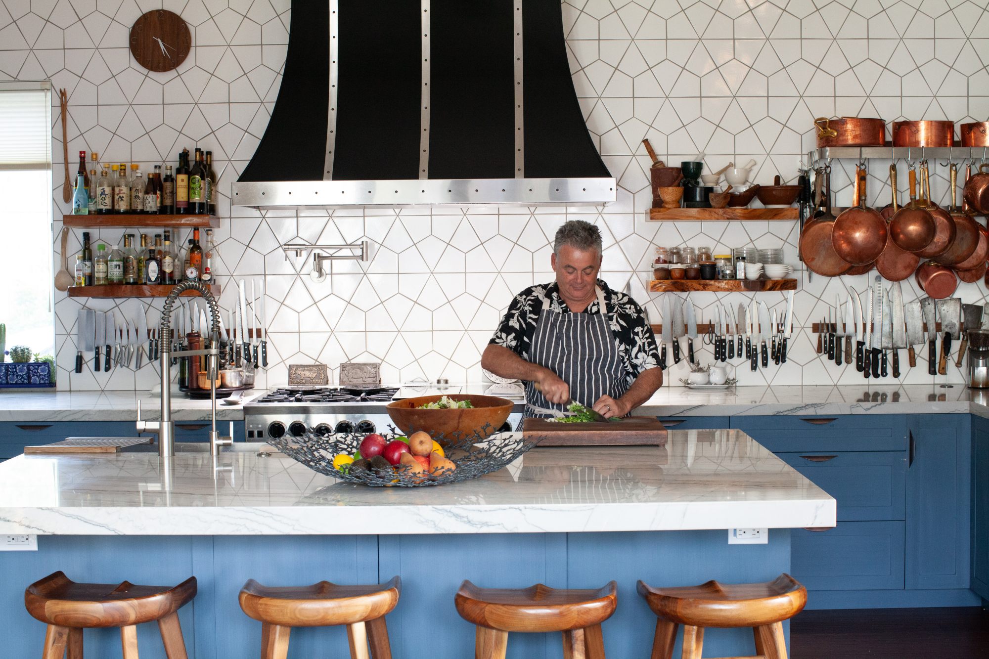 Josh Silvers cooking in the kitchen of his Santa Rosa home. (Eileen Roche)

