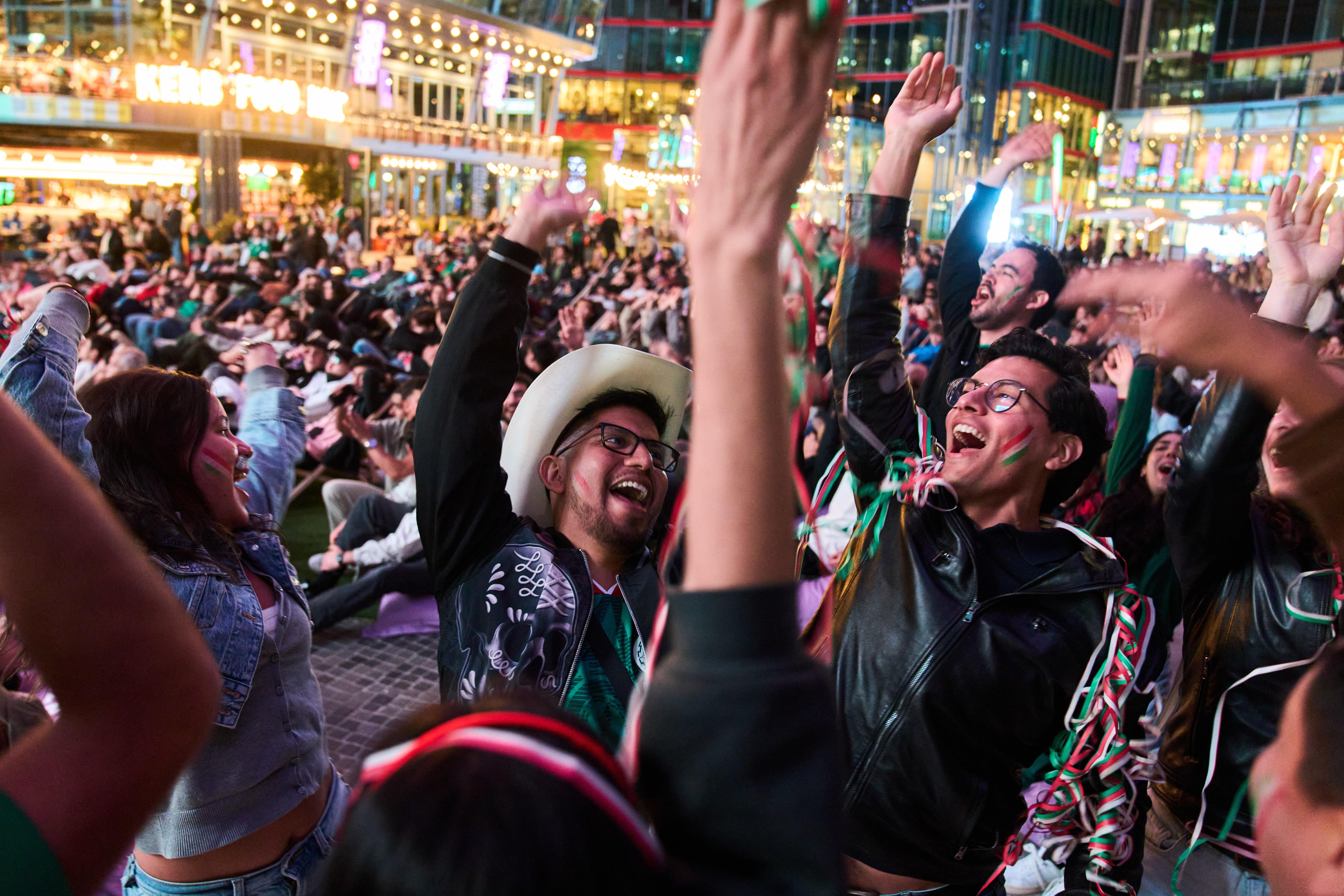 Germany_WCup_Soccer_Reaction_36498 Fans react as they watch a broadcast of the World Cup soccer match between Mexico and South Africa in Berlin, Germany, Thursday, June 11, 2026. (AP Photo/Ebrahim Noroozi)