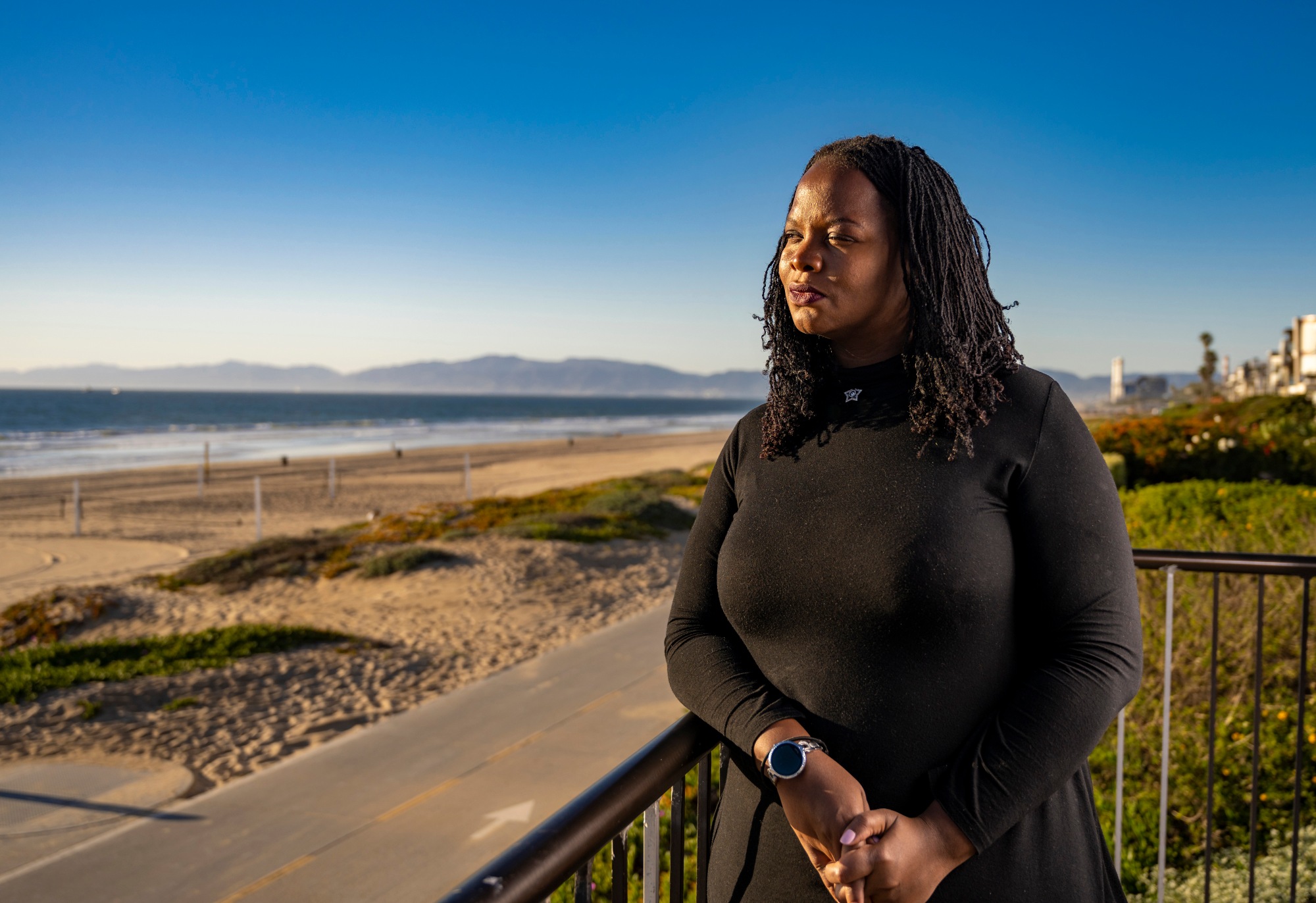 Community Organizer Kavon Ward, co-founder of Where Is My Land and founder of Justice for Bruce’s Beach, is shown at Bruce’s Beach in Manhattan Beach on Thursday, February 17, 2022. Ward, spearheaded the movement to get ownership of Bruce’s Beach land back to descendants of the Black couple Willa and Charles Bruce who ran a Black-serving beach resort at the location. Nearly a century after the property was seized from the Bruce family it will be returned to their descendants. The Bruce property consists of 2 parcels located between the park and the beach. Currently, the Los Angeles Lifeguard Training Center partially sits on the 2 parcels.  (Photo by Leonard Ortiz, Orange County Register/SCNG)
