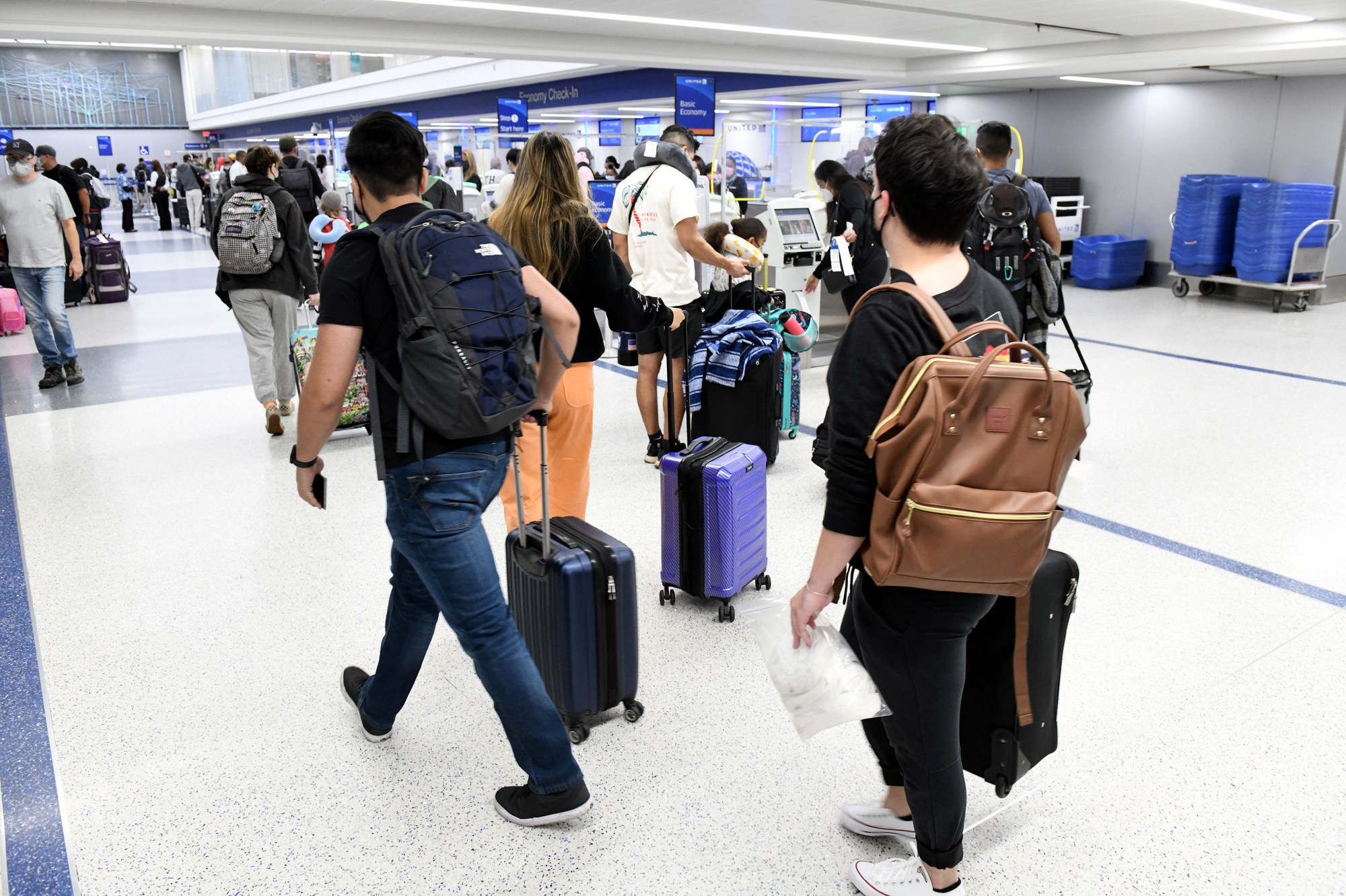 Travelers check in their luggage at LAX.
(SCNG, File photo by Axel Koester, Contributing Photographer)