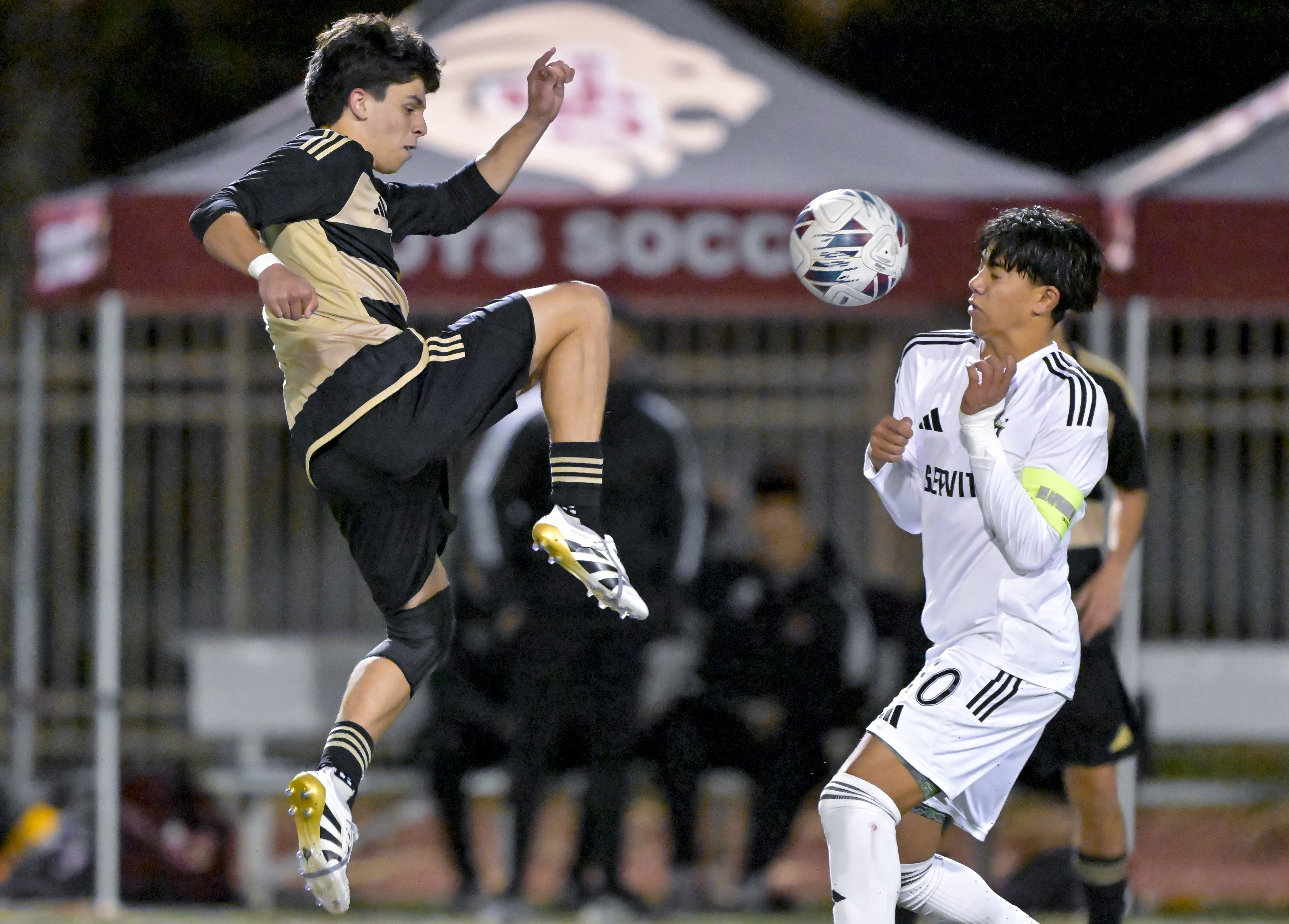AC Coltman (35) of JSerra kicks the ball over Nico Pacelli (10) of Servite in a boys soccer game at JSerra Catholic High in San Juan Capistrano on Wednesday, January 7, 2026. (Photo by Leonard Ortiz, Orange County Register/SCNG)
