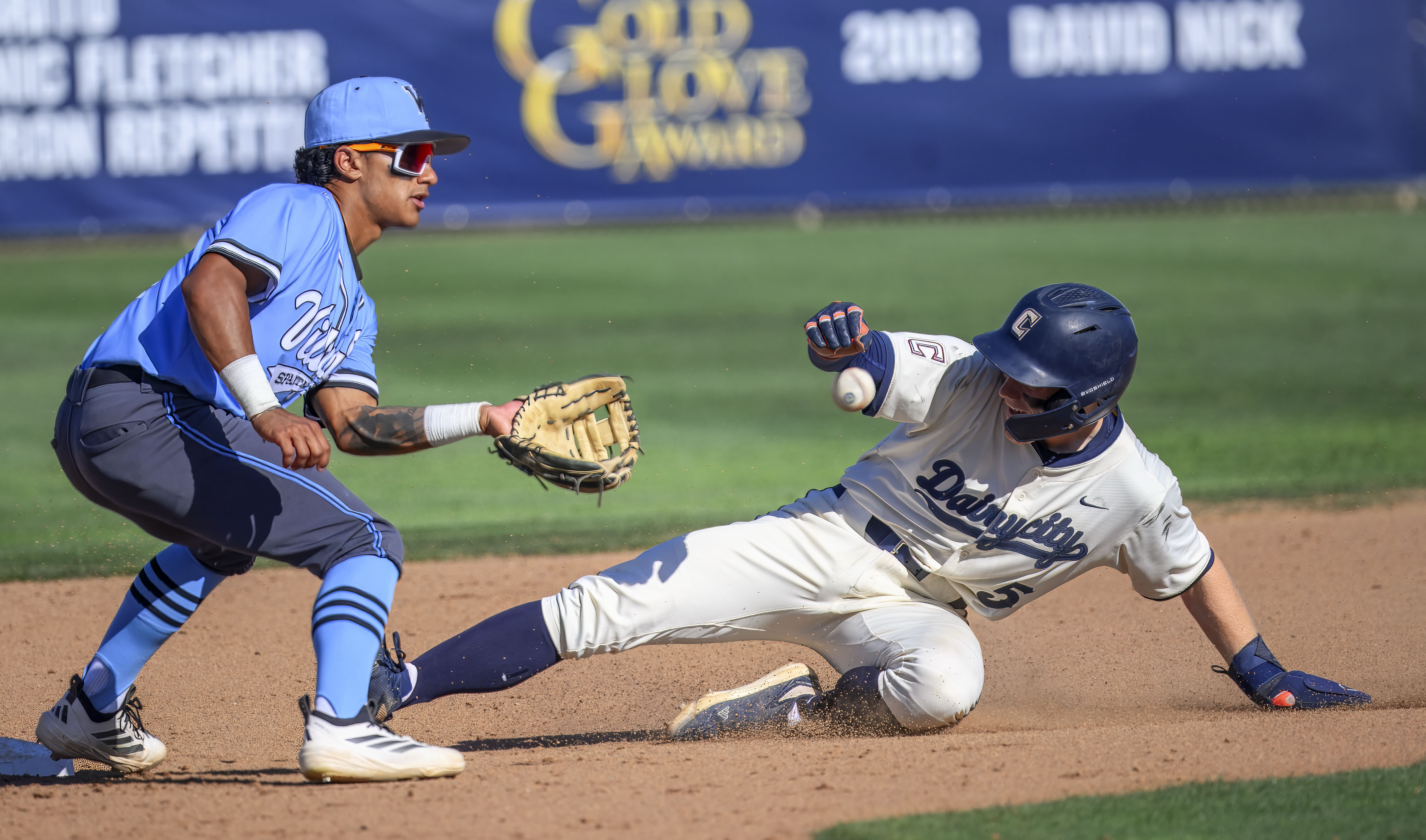 Cypress’ Jake de Laquil, left, slides into the bag at second for a steal on the late throw to Villa Park shortstop Justin Lopez in a Crestview League baseball game in Cypress on Tuesday, March 17, 2026. (Photo by Paul Rodriguez, Contributing Photographer)
