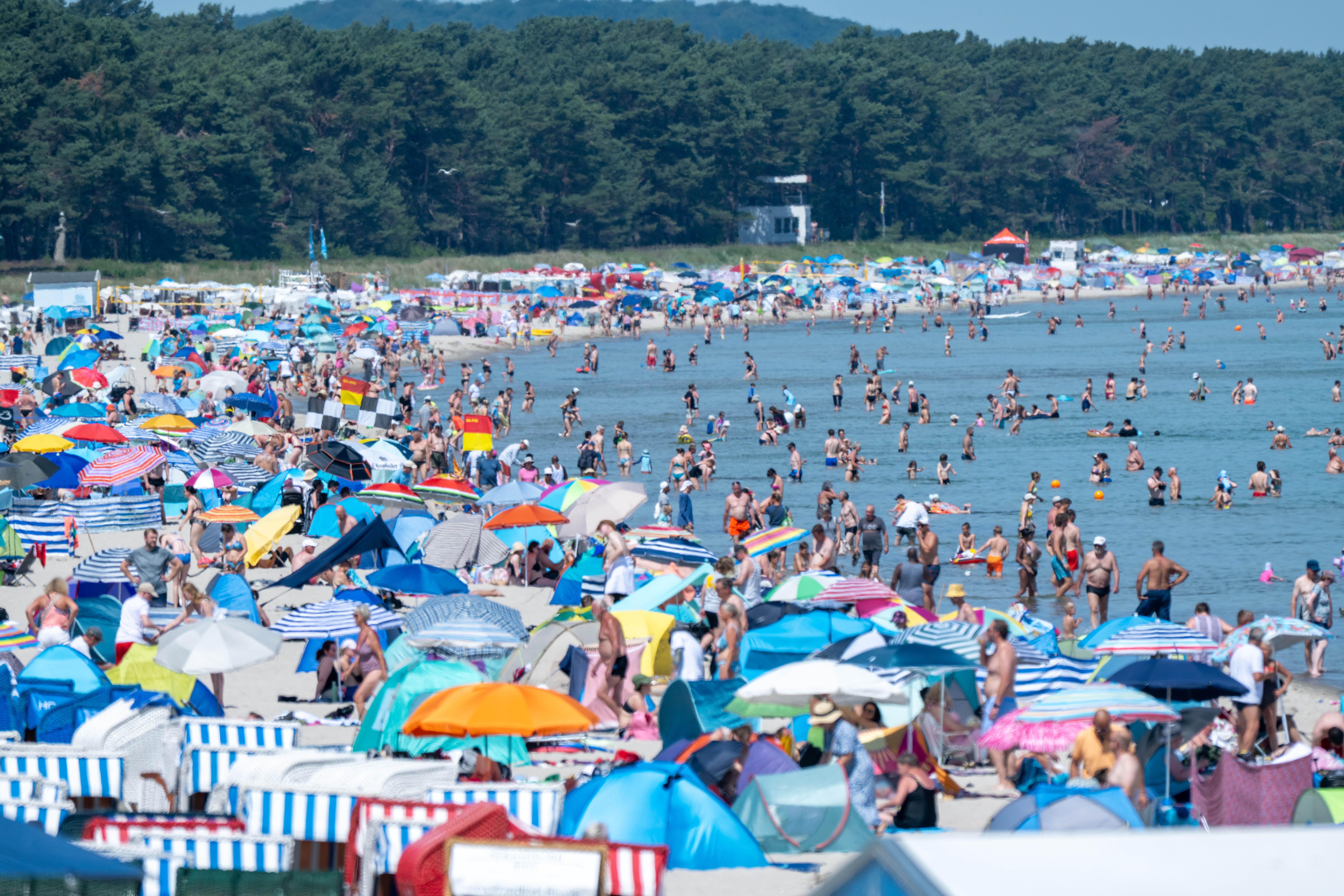 People crowd the beach at the seaside resort on the island of Rügen, Germany, Saurday, June 27, 2026, as the heat wave continues over Europe. (Stefan Sauer/dpa via AP)
