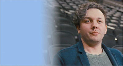 A person sitting in auditorium