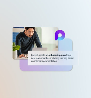 Seorang laki-laki menggunakan laptop