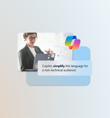 Seorang perempuan berjas melihat ke laptop.