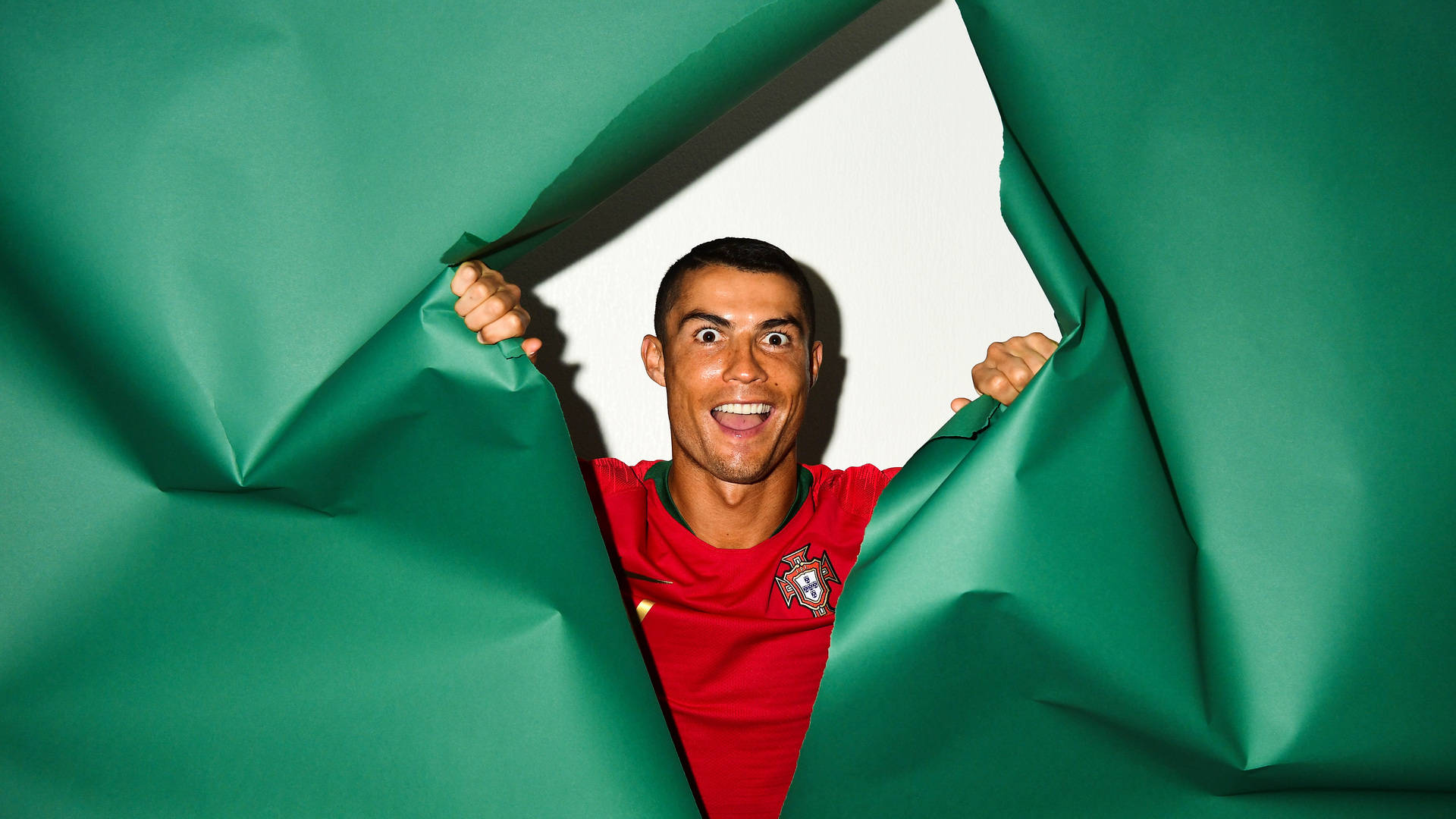 CR7 HD Ripping Green Paper Wallpaper