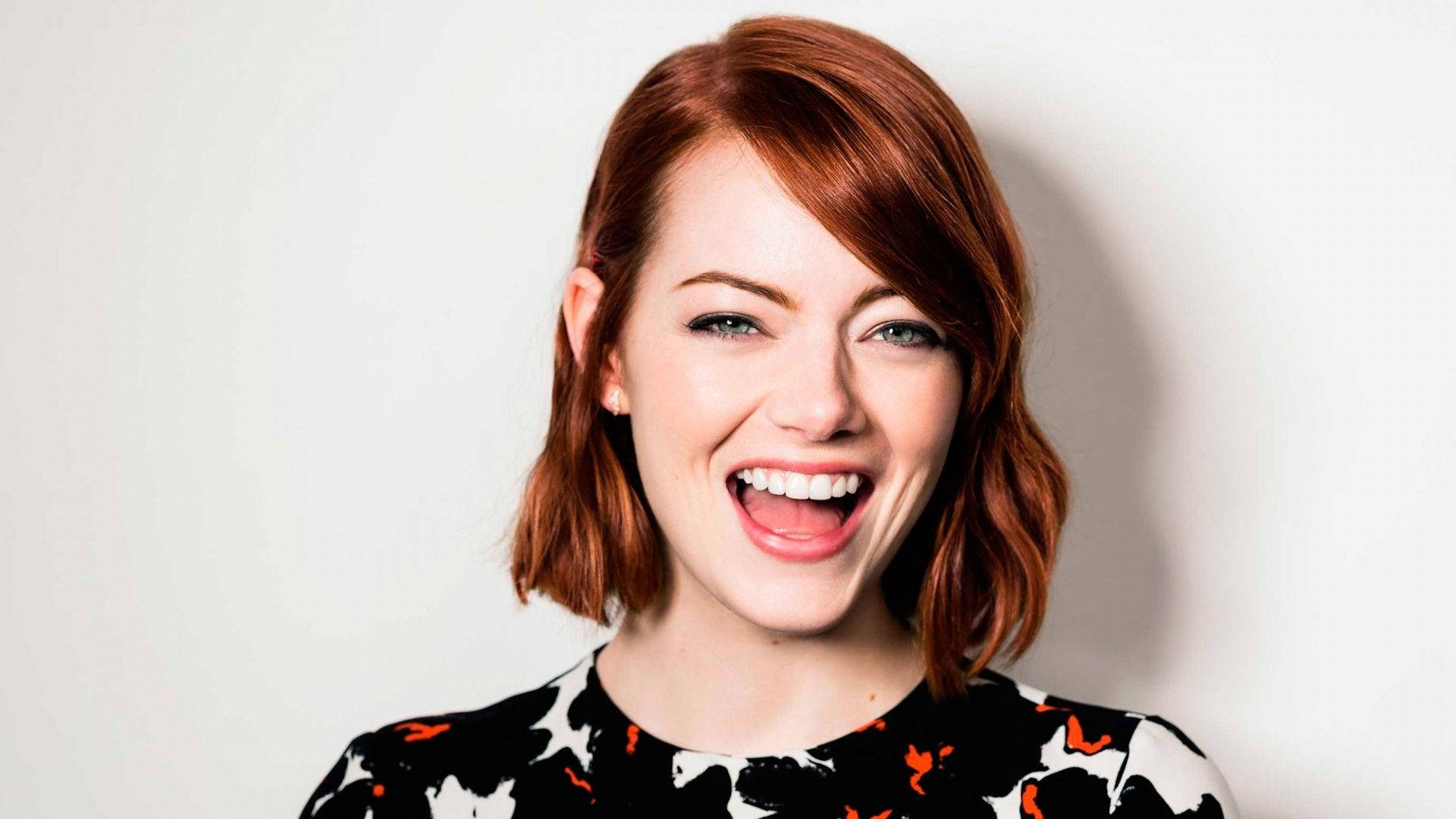 Emma Stone in a Dazzling Portrait Wallpaper
