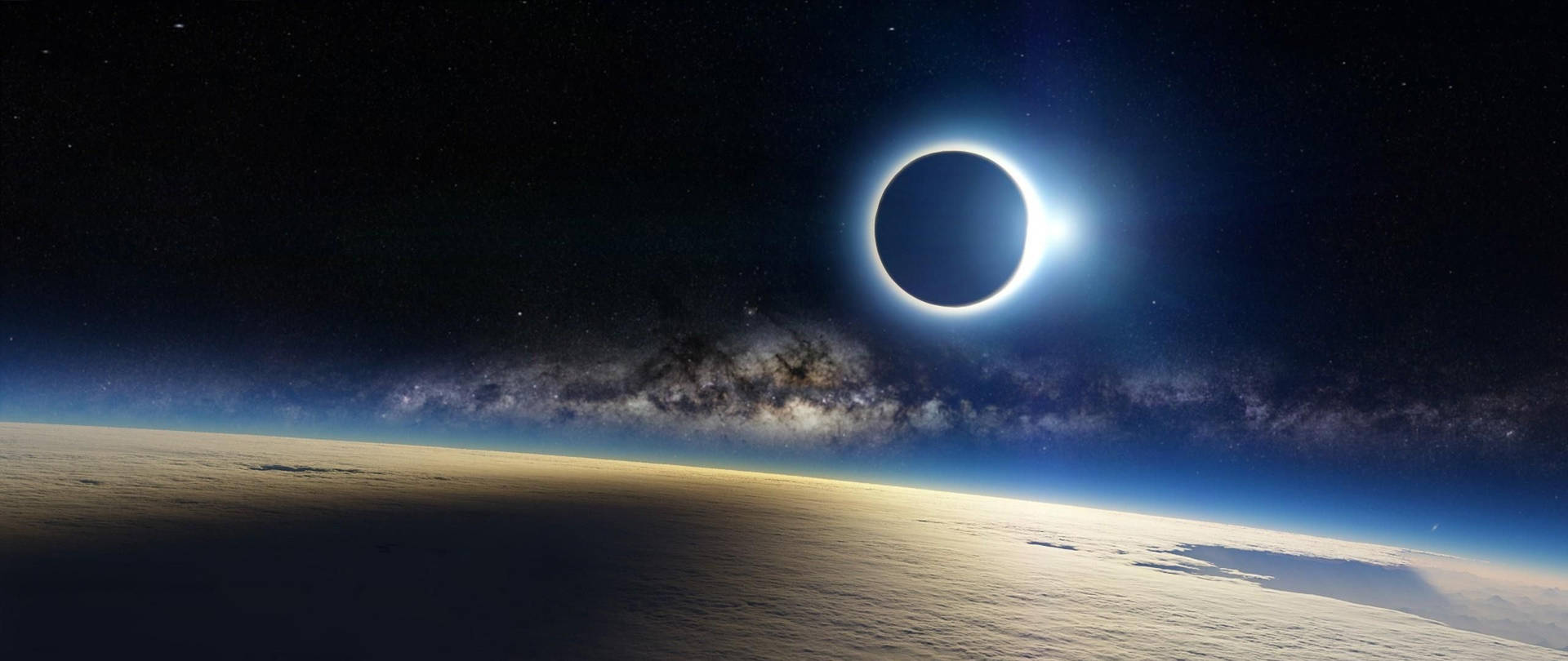"Experience a stunning eclipse in outer space." Wallpaper