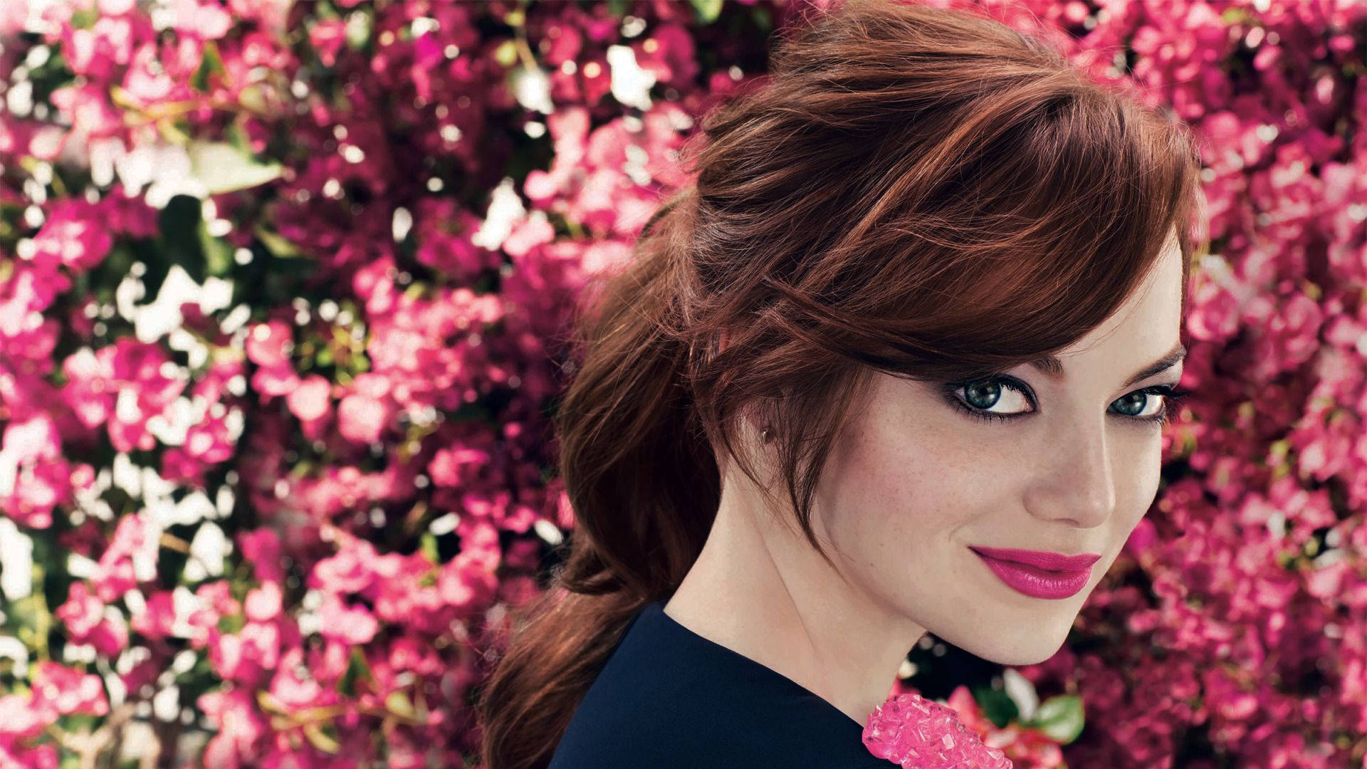 Emma Stone with pink flowers Wallpaper