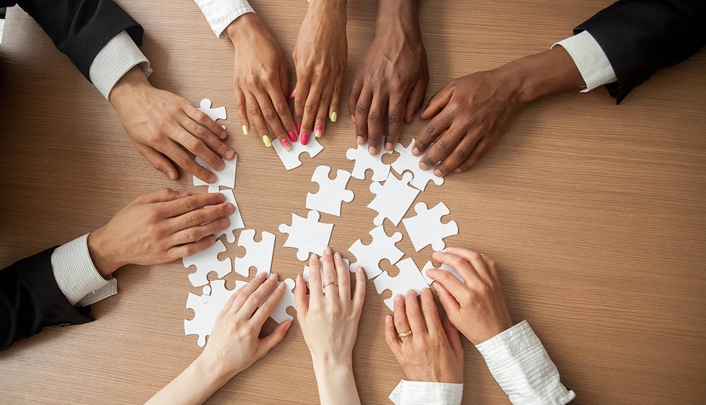 Teamwork in Action at an Enterprise Wallpaper