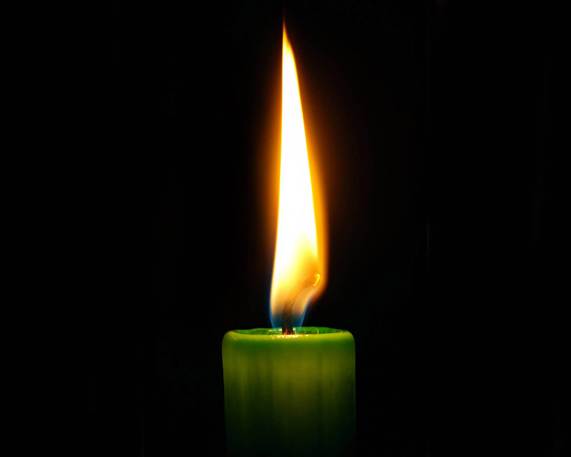 Enlightening Green Wax Candle Wallpaper