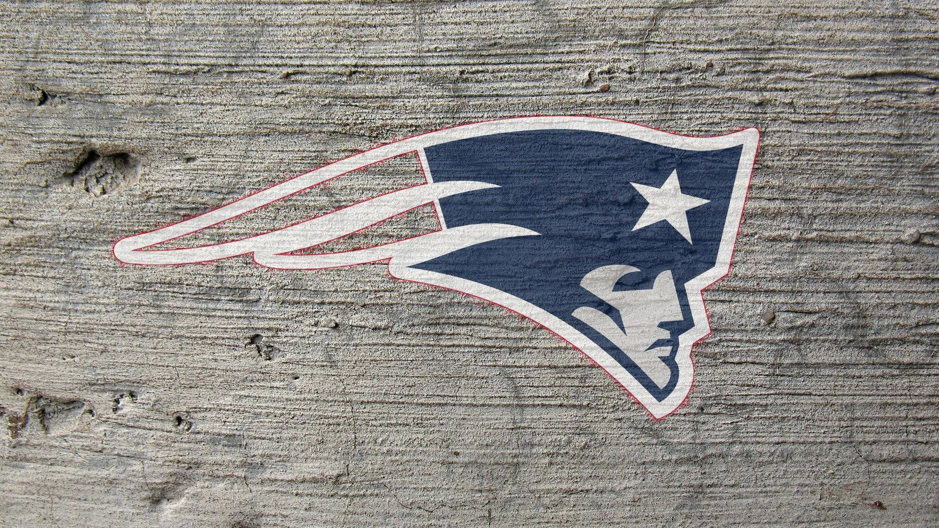 The Official Patriots Logo Emblazoned in Concrete Wallpaper