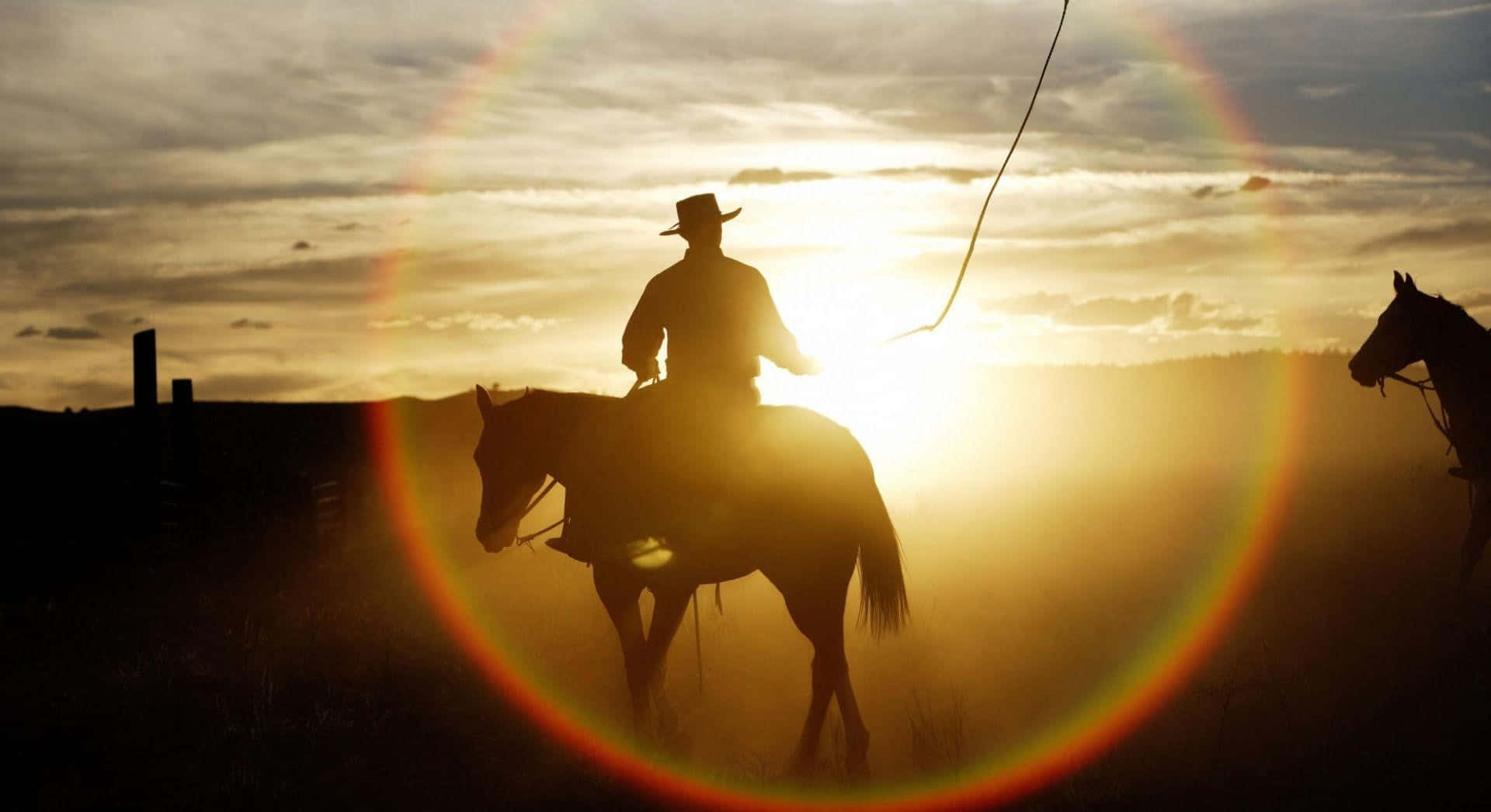 Dosvaqueros Montando A Caballo En El Atardecer Fondo de pantalla