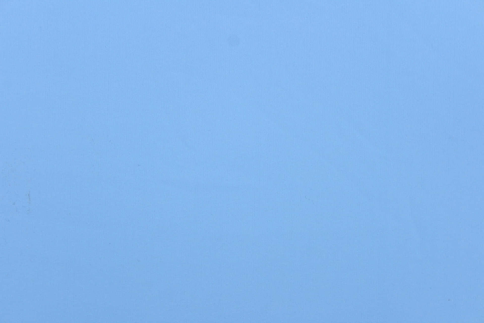 A Classic Solid Light Blue Background for Any Design
