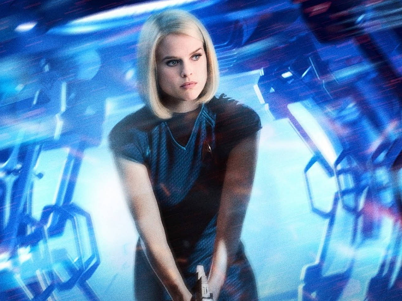 Dr. Carol Marcus standing against the backdrop of a starship in Star Trek Into Darkness Wallpaper