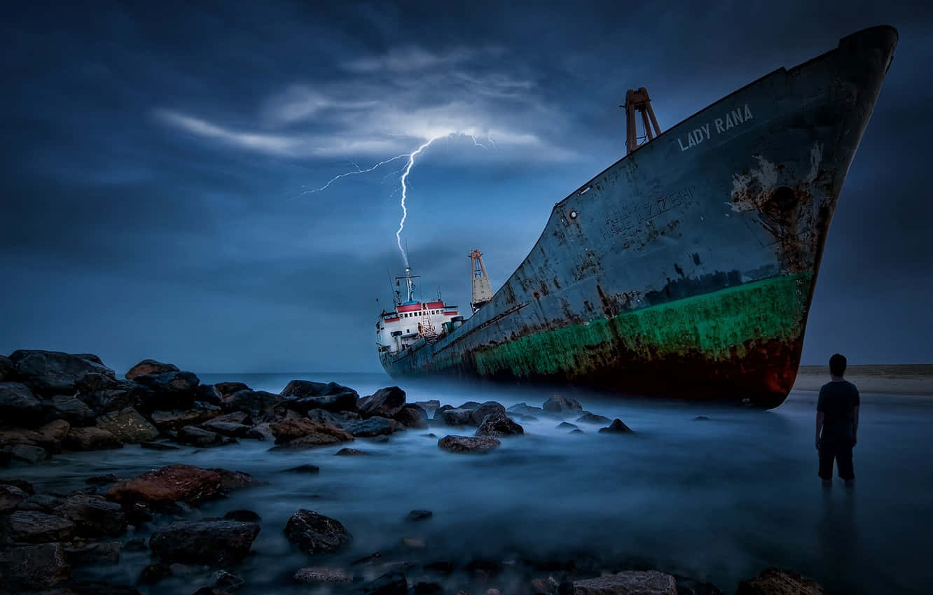 Stranded Person From Broken Ship Wallpaper