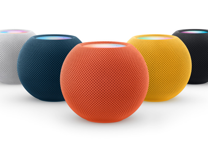 Van links naar rechts: HomePod mini in de kleuren Wit, Blauw, Oranje, Geel en Middernacht